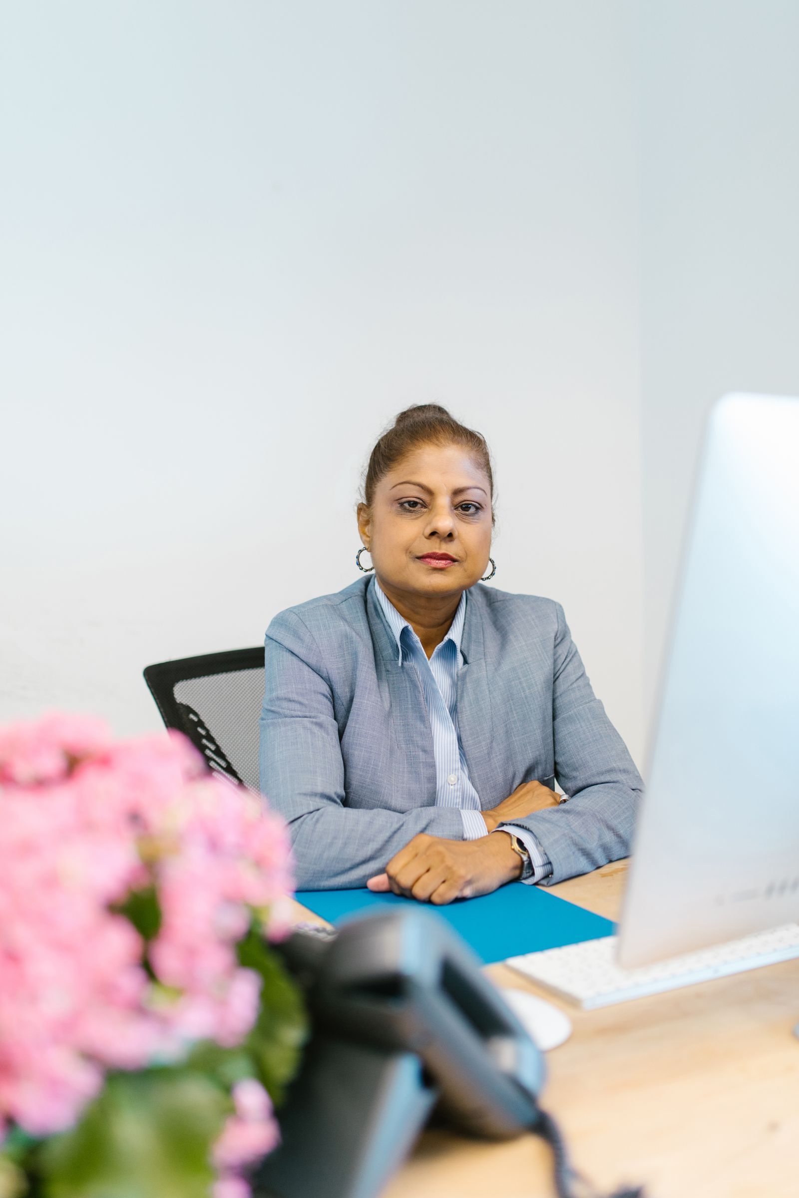 Priya Raman at her desk in San Jose