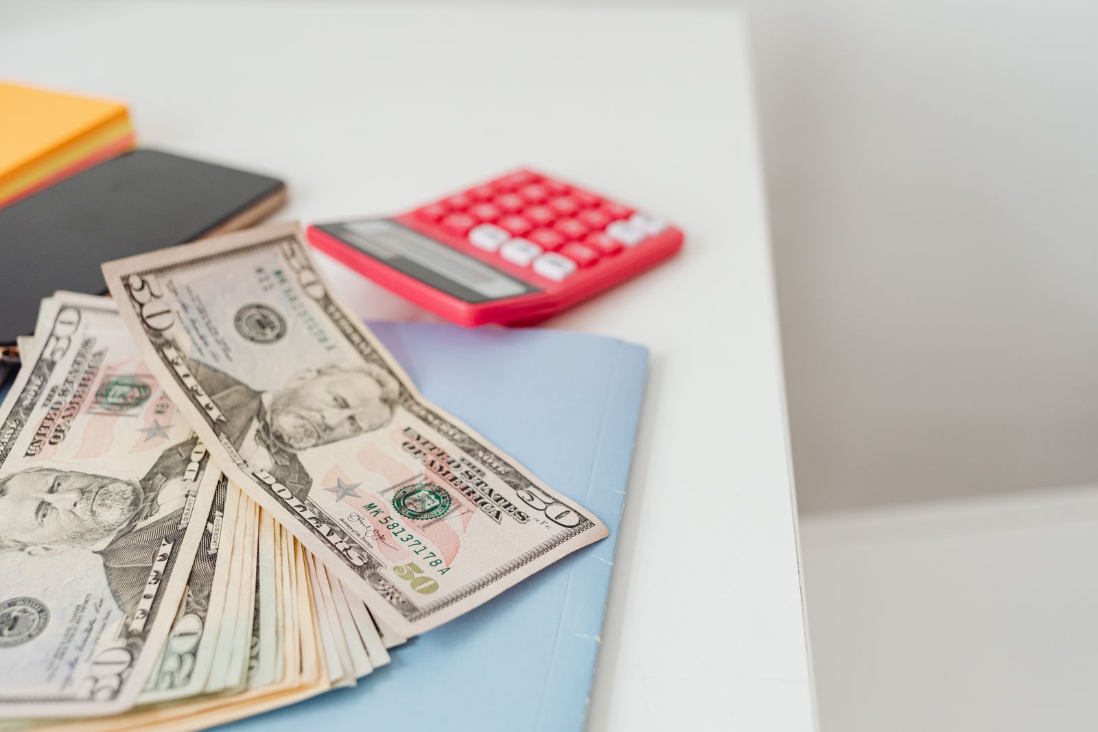 Planning a home budget with a laptop and notes